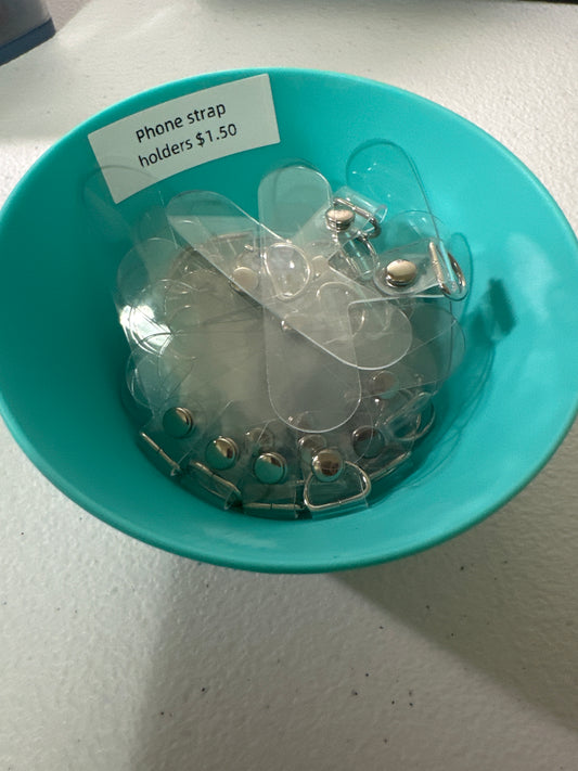 Phone tether holders