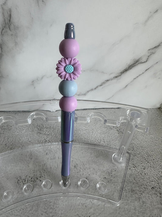 Beaded ink pens