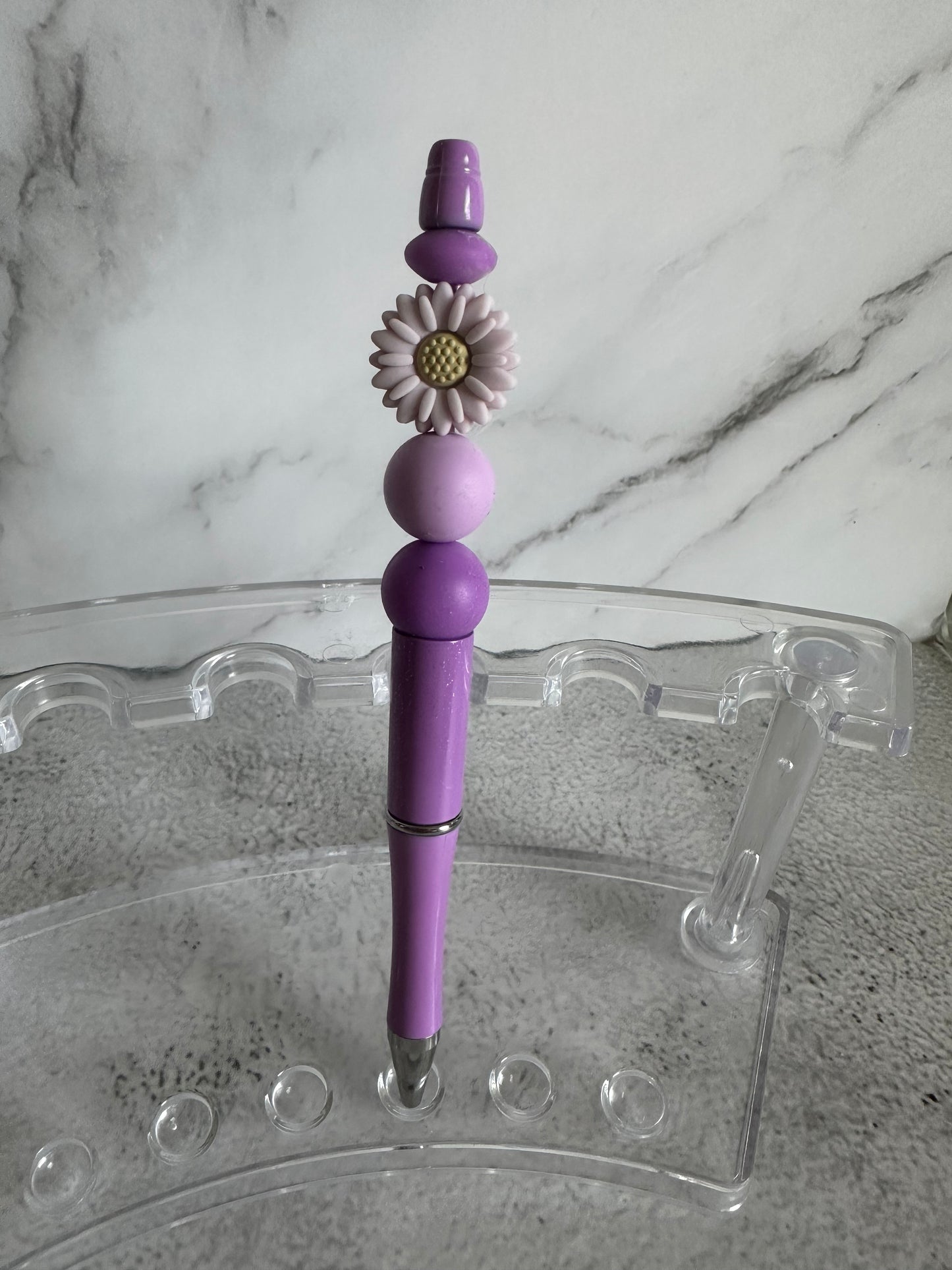 Beaded ink pens